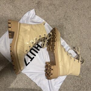 SCHUTZ Orly Crocodile embossed combat boots in eggshell / white with dust bag